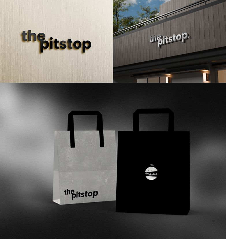 The Pitstop brand identity applied to signage and takeaway bags